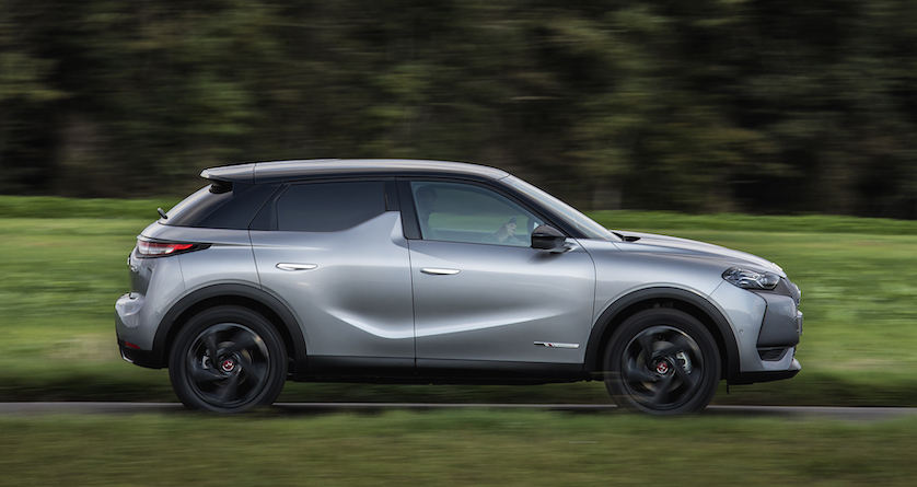 DS3 Crossback E tense exterior side driving in forest